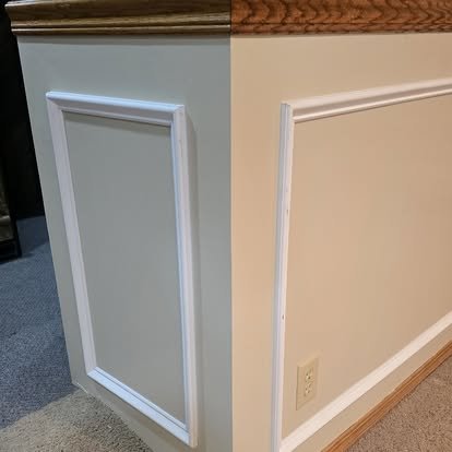 Before and after: wainscoting installation corner — transformation from bare grey wall to finished white panel trim